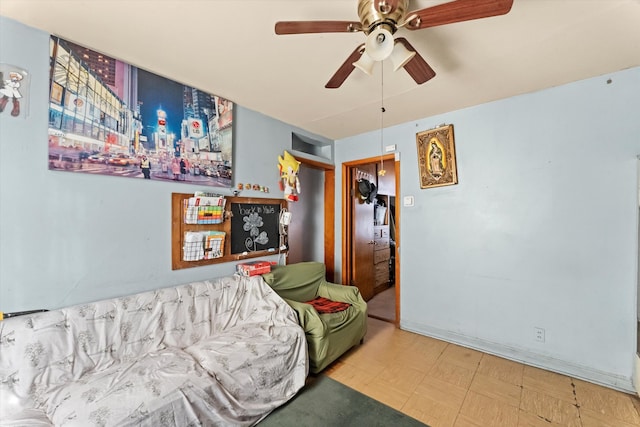 living room with ceiling fan