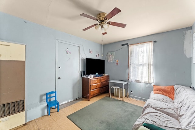 living room with ceiling fan