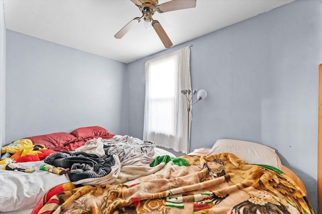 bedroom featuring ceiling fan