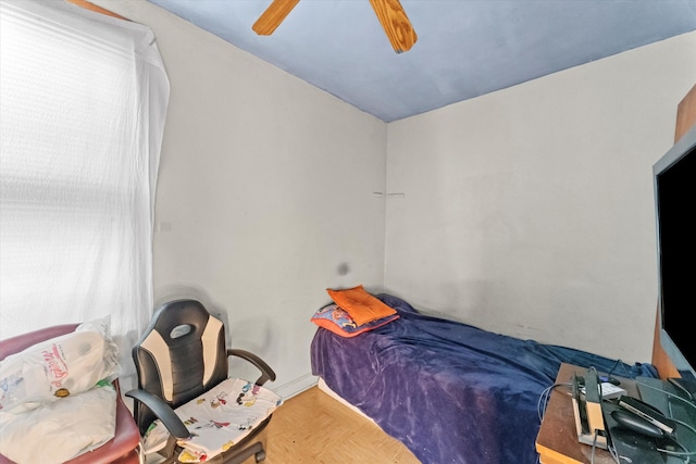 bedroom with vaulted ceiling and ceiling fan