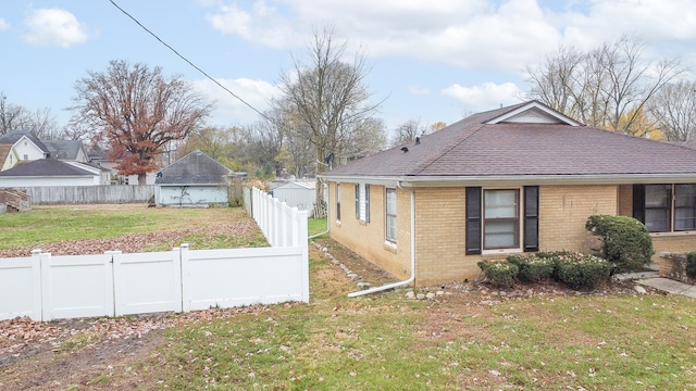 view of property exterior featuring a yard