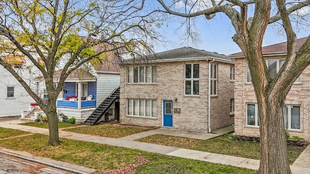 view of front of home with a front yard