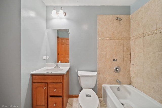 full bathroom featuring tile patterned flooring, vanity, toilet, and tiled shower / bath