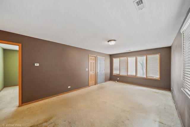 unfurnished bedroom with light carpet