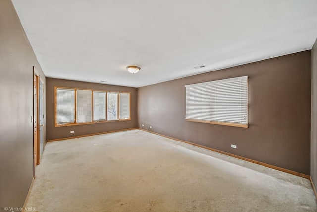 view of carpeted spare room