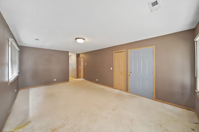 view of carpeted spare room