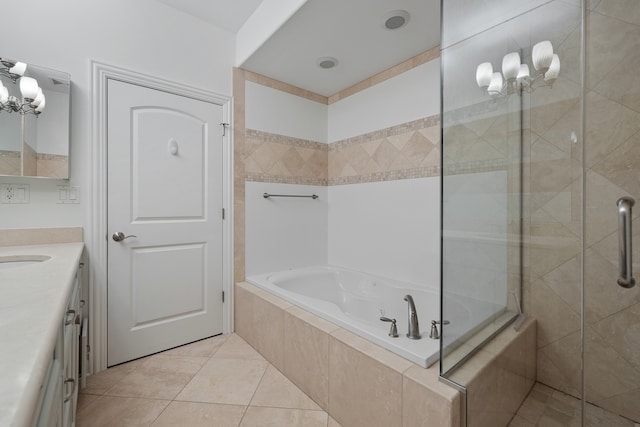 bathroom with vanity, tile patterned floors, and independent shower and bath