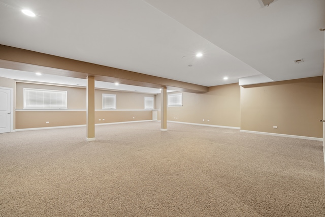 basement featuring carpet flooring