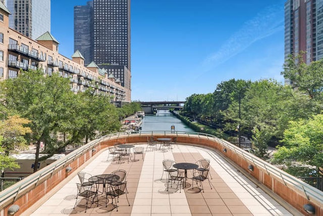 view of patio / terrace with a water view