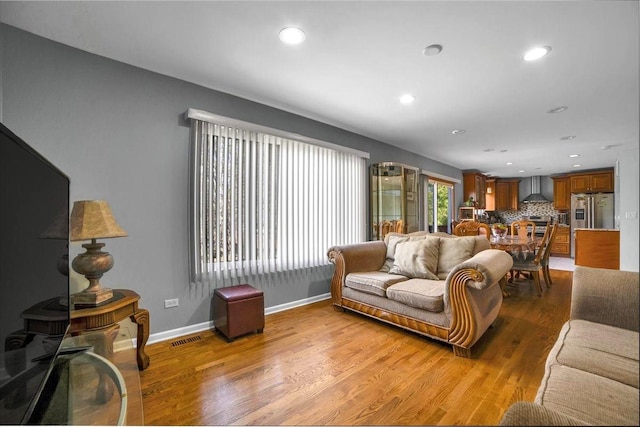 living room featuring light wood-type flooring