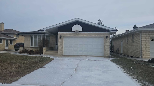 ranch-style house featuring a garage