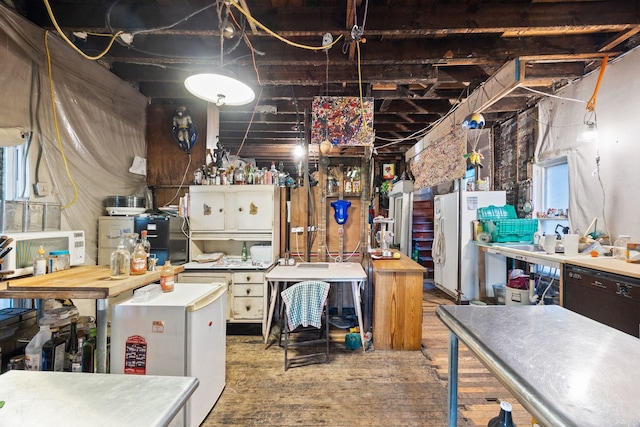 kitchen featuring dishwasher and wood-type flooring