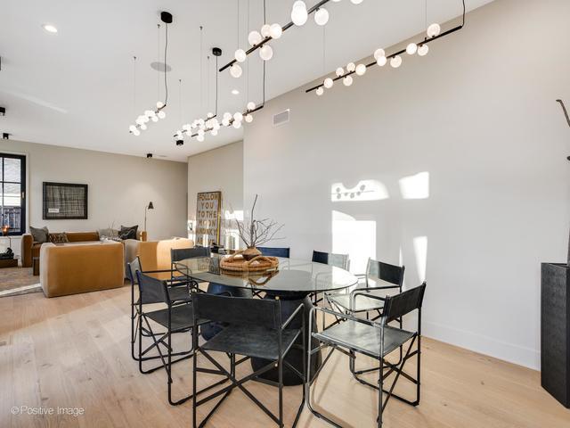 dining space with light wood-type flooring