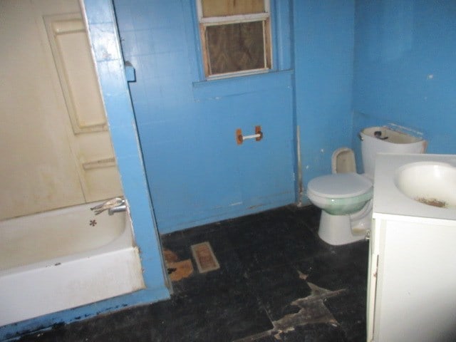 full bathroom with vanity, toilet, and tiled shower / bath