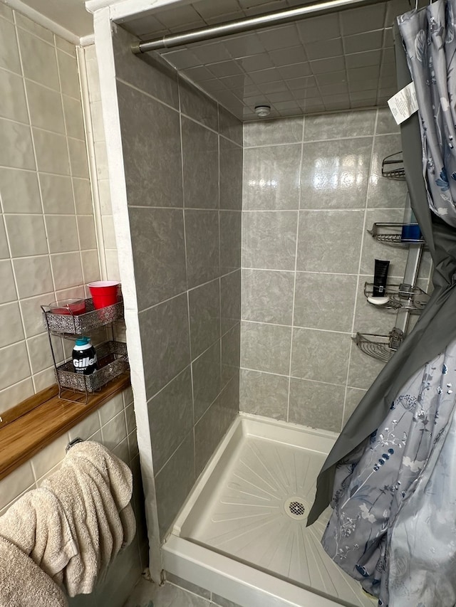 bathroom with a shower with shower curtain