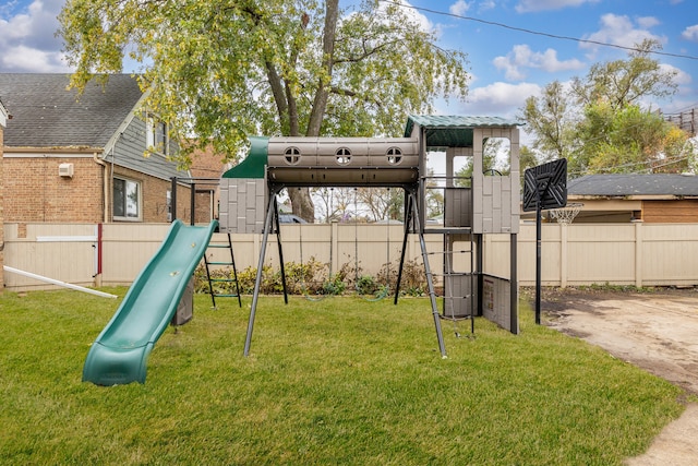 view of jungle gym featuring a lawn