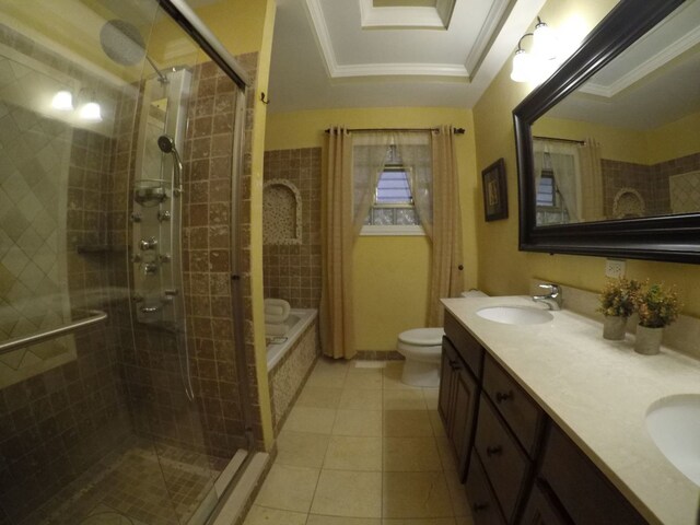 bathroom with tile patterned floors, crown molding, vanity, and toilet