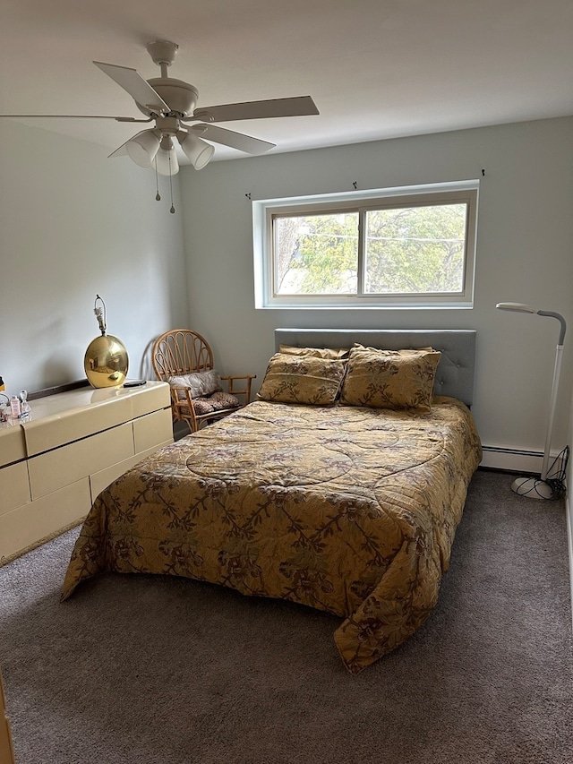 carpeted bedroom with ceiling fan, a baseboard radiator, and multiple windows