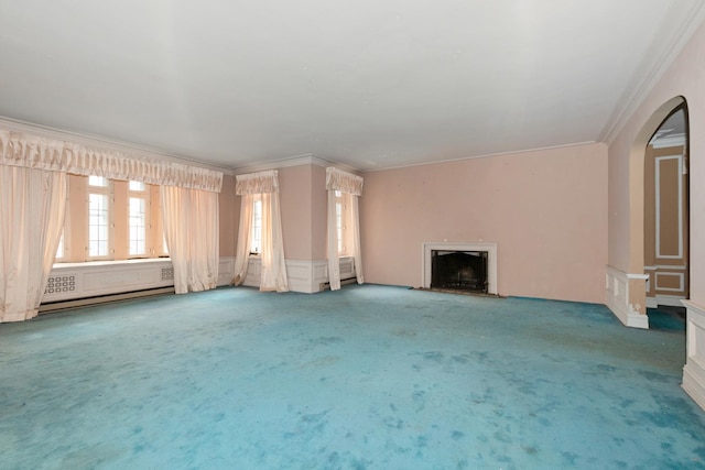 6922 S Jeffery Blvd Unit 3S, Chicago, IL 60649 - unfurnished living room featuring carpet flooring, crown molding, a fireplace, a decorative wall, and a baseboard heating unit