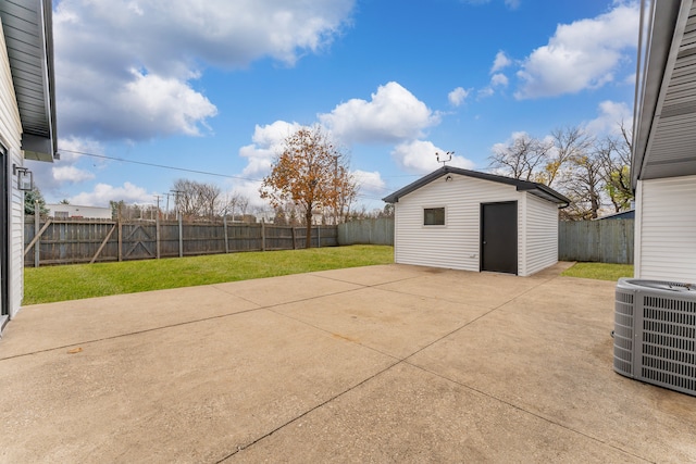 view of patio / terrace with a storage shed and central air condition unit