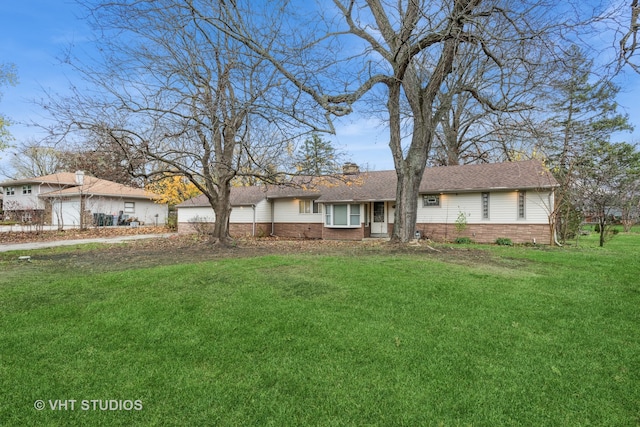 ranch-style house with a front yard