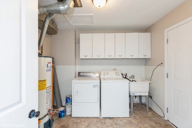 washroom featuring water heater, cabinets, sink, and independent washer and dryer