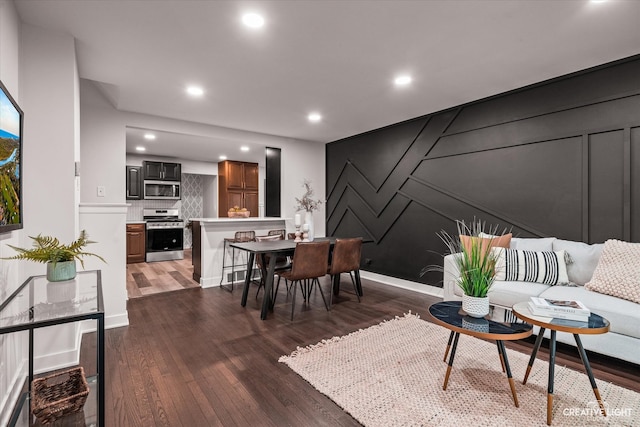 living room with dark wood-type flooring