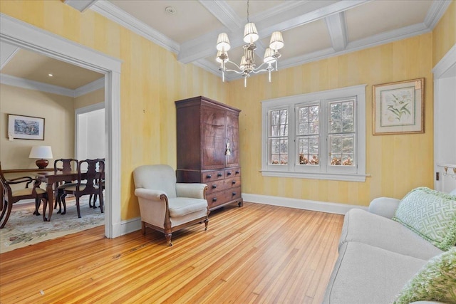 living area with beam ceiling, an inviting chandelier, and crown molding