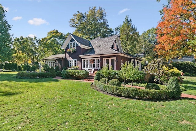 back of house featuring a yard