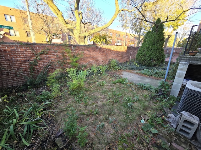 view of yard featuring central AC