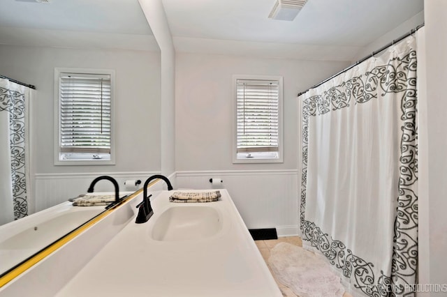 bathroom featuring vanity and tile patterned floors