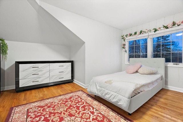 bedroom featuring wood-type flooring