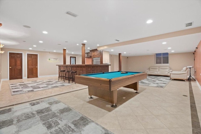 playroom with bar, light tile patterned floors, and billiards