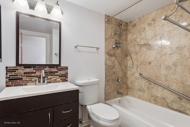 full bathroom featuring vanity, tasteful backsplash, toilet, and tiled shower / bath combo