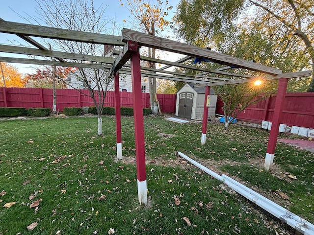 view of yard featuring a pergola and a storage shed