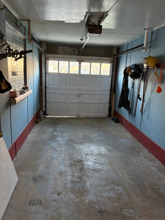 garage featuring a garage door opener