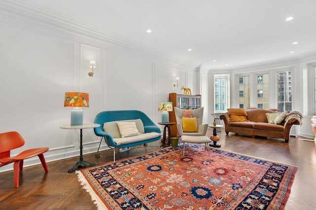 living room with dark parquet flooring and ornamental molding