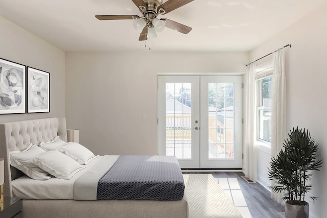 bedroom featuring access to exterior, ceiling fan, french doors, and hardwood / wood-style floors