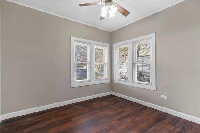 spare room with ceiling fan, dark hardwood / wood-style flooring, and ornamental molding