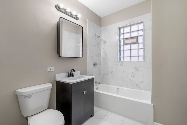 full bathroom featuring vanity, toilet, and tiled shower / bath