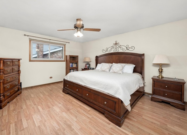 bedroom featuring light wood-type flooring and ceiling fan