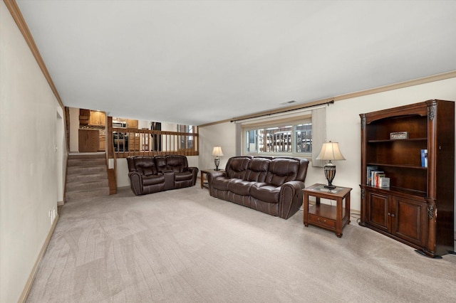 living room with light colored carpet and crown molding