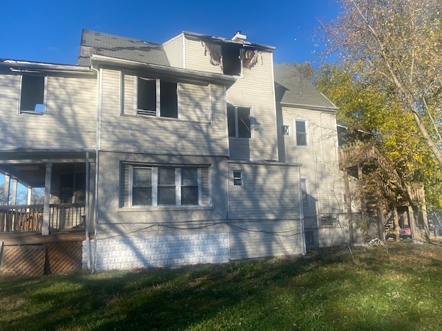 view of side of property featuring a yard