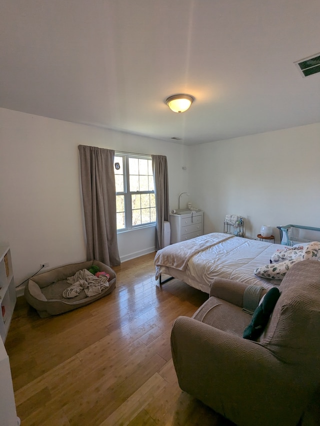 bedroom featuring light hardwood / wood-style flooring