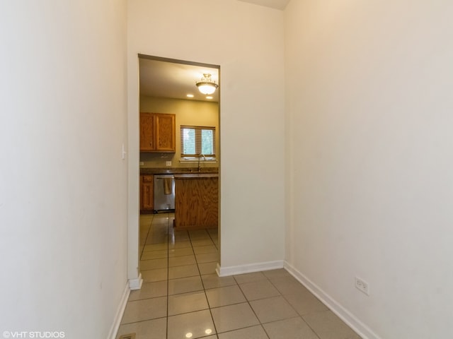 hallway with light tile patterned flooring