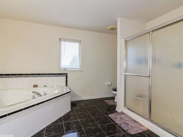 bathroom with tile patterned flooring, toilet, and independent shower and bath