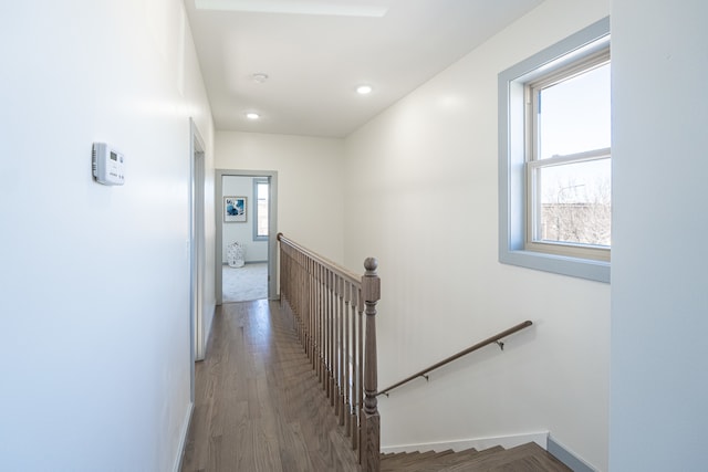 hall with wood-type flooring