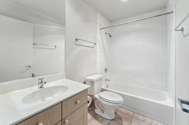 full bathroom featuring tiled shower / bath, tile patterned flooring, vanity, and toilet