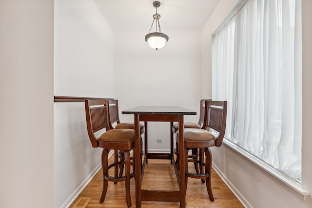 dining room featuring hardwood / wood-style floors