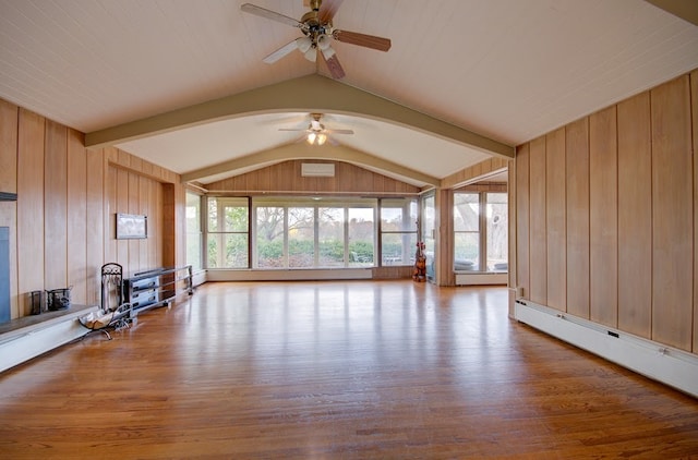 unfurnished living room with lofted ceiling with beams, light hardwood / wood-style flooring, ceiling fan, and wood walls